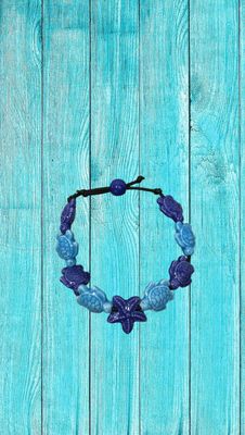 Bracciale tartarughe in ceramica colore turchese e blu, stella blu.