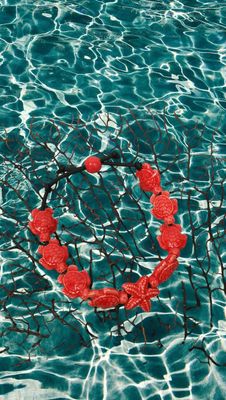 Bracciale tartarughe in ceramica colore rosso.