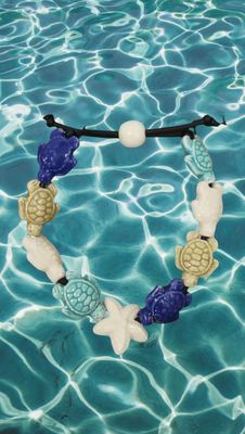 Bracciale tartarughe in ceramica colore blu,beige,bianco e verde smeraldo, stella bianca.