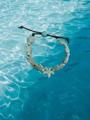 Bracciale tartarughe in ceramica colore verde smeraldo.