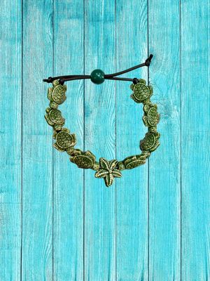 Bracciale tartarughe in ceramica colore verde scuro.