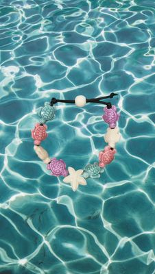 Bracciale tartarughe in ceramica colore lilla,bianco,rosa chiaro e verde smeraldo, stella bianca.