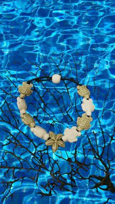 Bracciale tartarughe in ceramica colore beige e bianco, stella beige