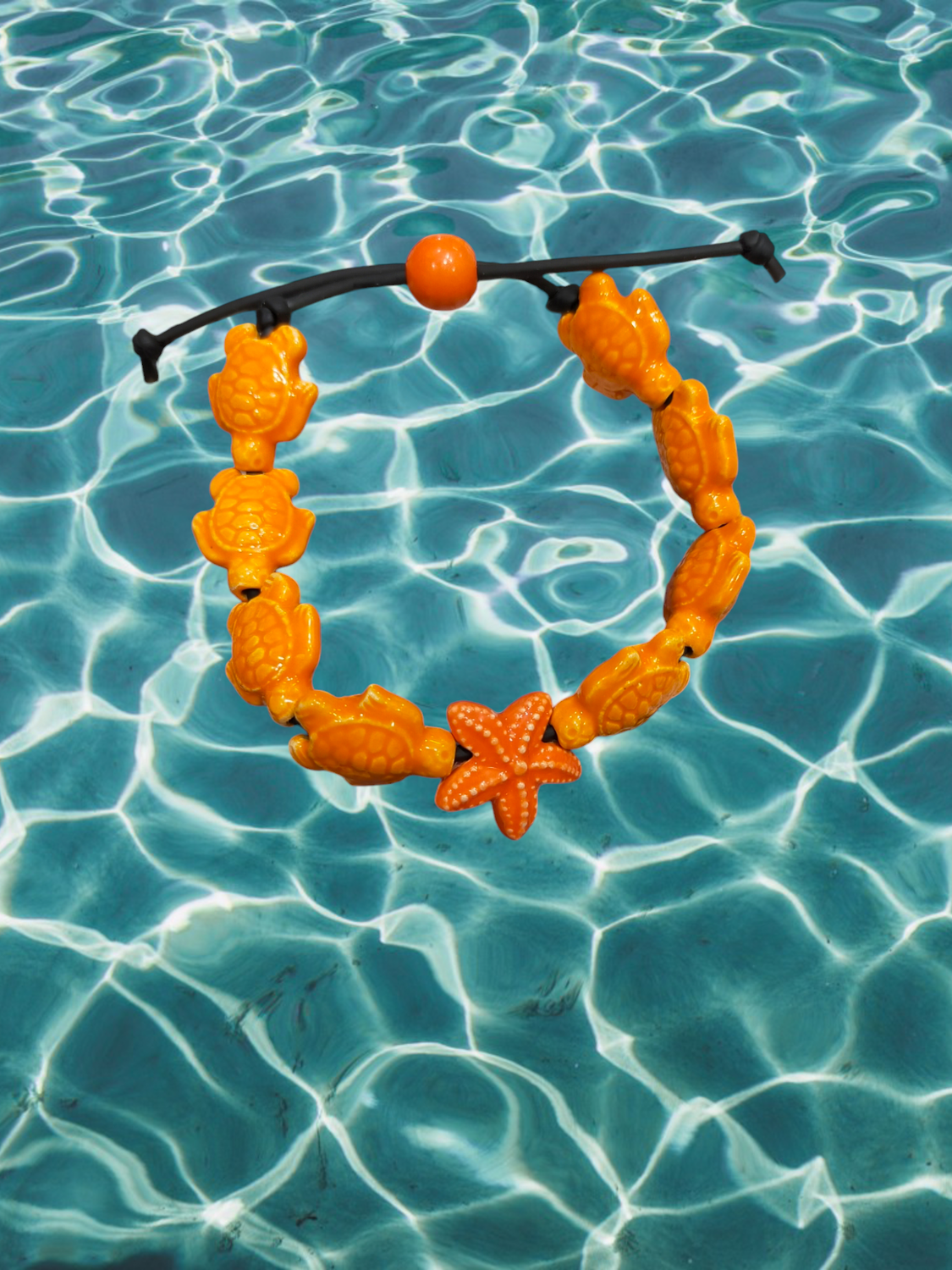Bracciale tartarughe in ceramica colore arancione