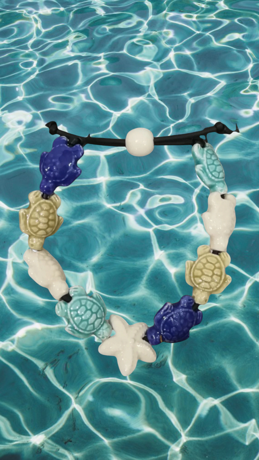 Bracciale tartarughe in ceramica colore blu,beige,bianco e verde smeraldo, stella bianca.