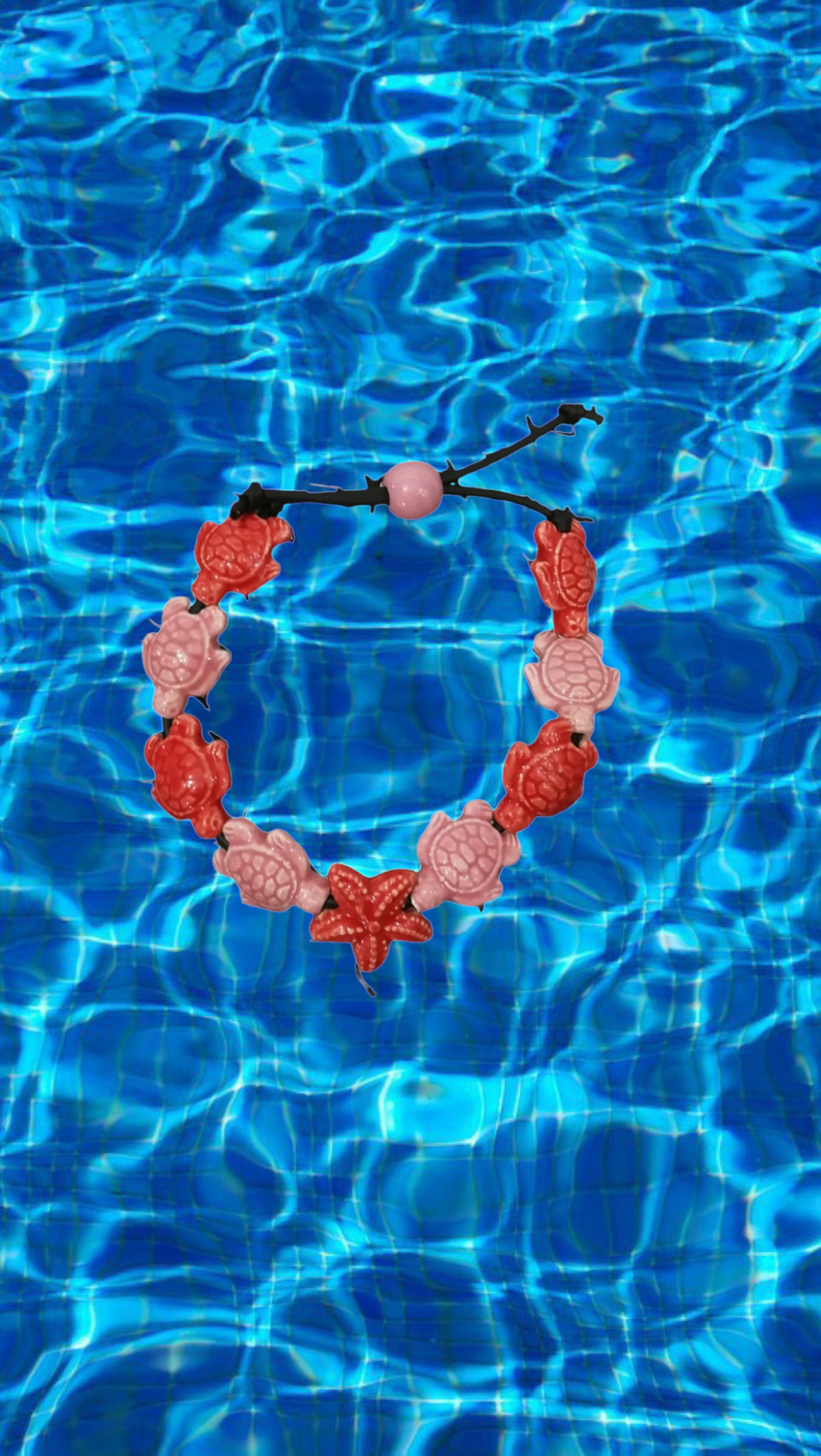 Bracciale tartarughe in ceramica colore rosa chiaro e rosa scuro, stella rosa scuro.