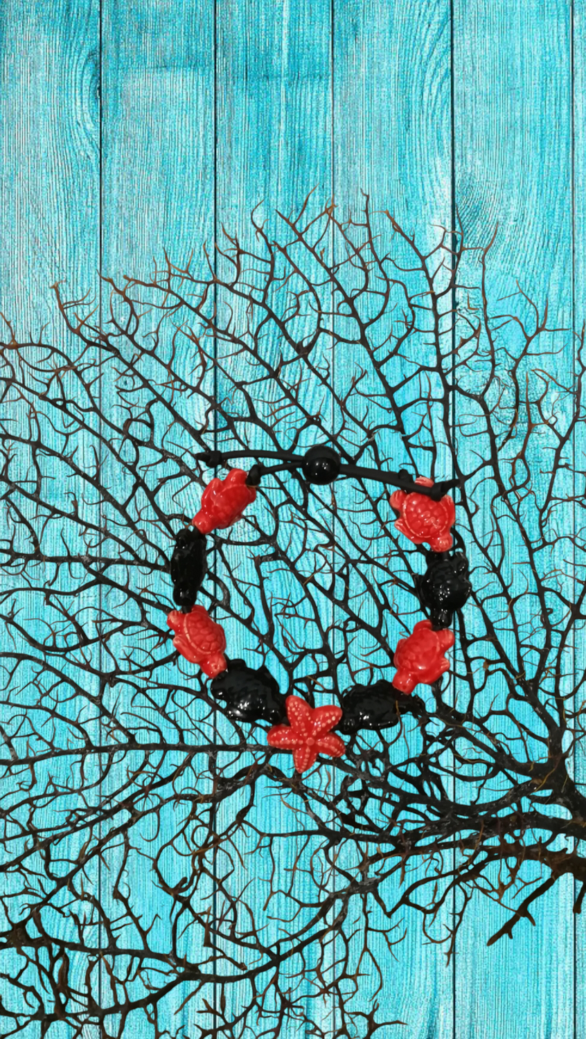 Bracciale tartarughe in ceramica colore rosso e nero stella rossa.