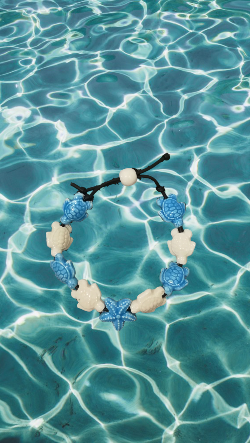 Bracciale tartarughe in ceramica colore turchese e bianco stella turchese.