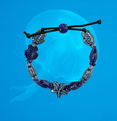 Bracciale tartarughe in ceramica colore blu carta da zucchero e blu scuro, stella blu carta da zucchero.