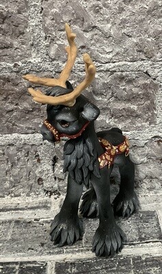 Black Reindeer with harness for sled