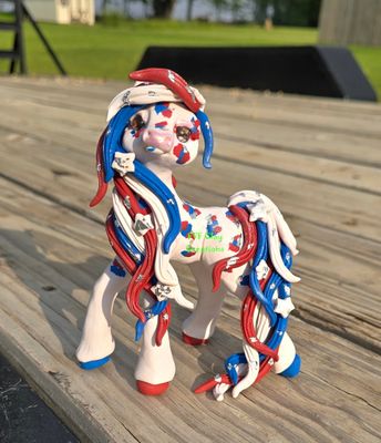 Red white and blue horse