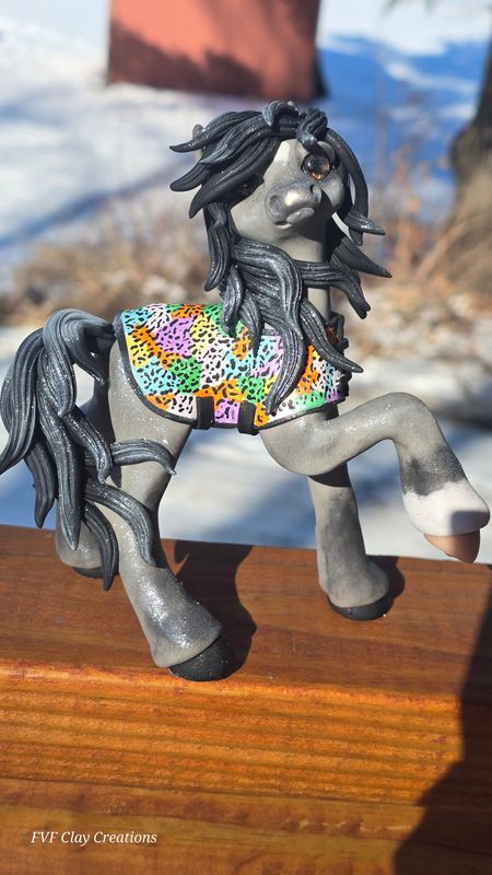 Grey blanket pony