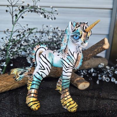 Teal,brown,gold zebra unicorn stallion