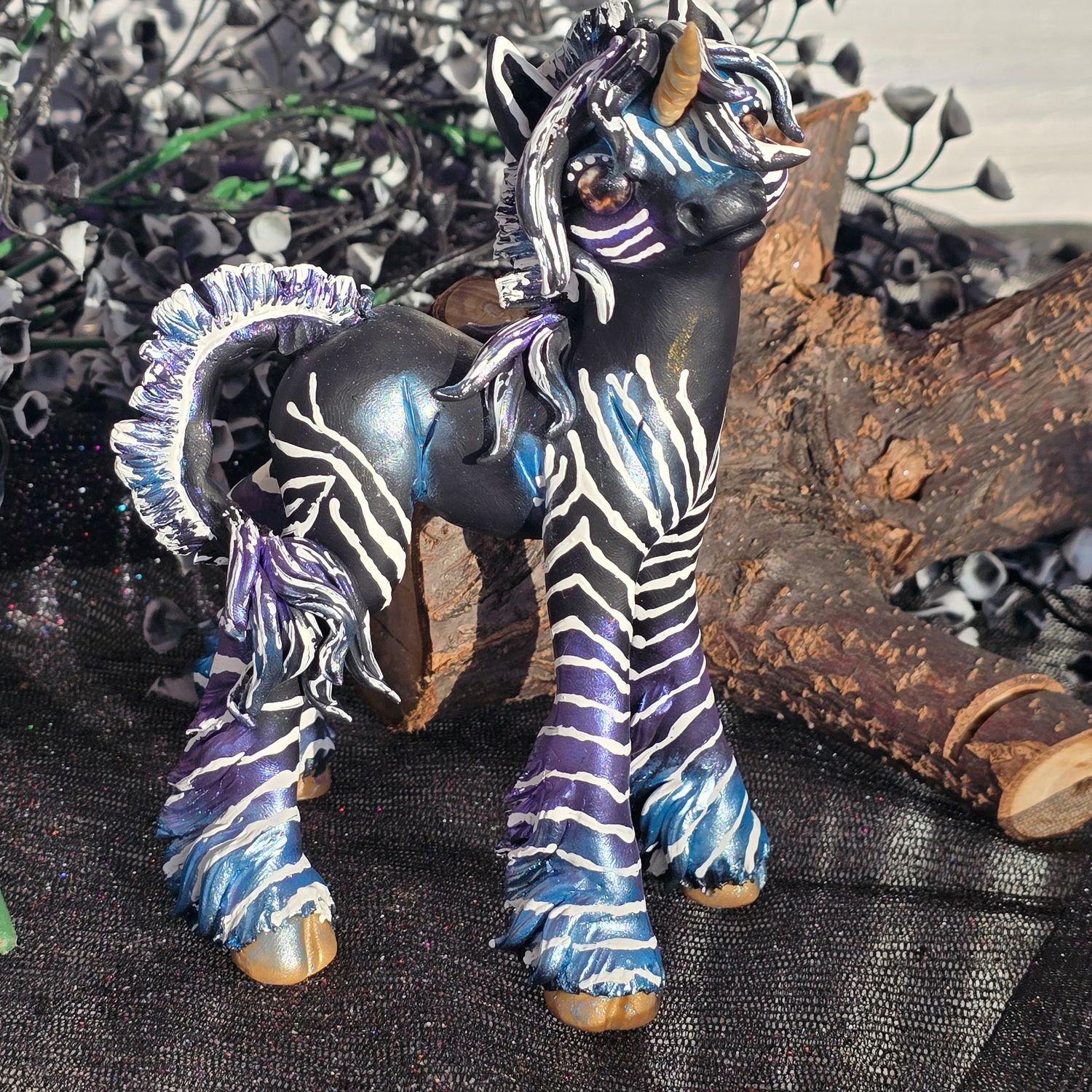 Black/purple/blue unicorn