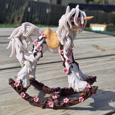 Cherry blossoms rocking pony