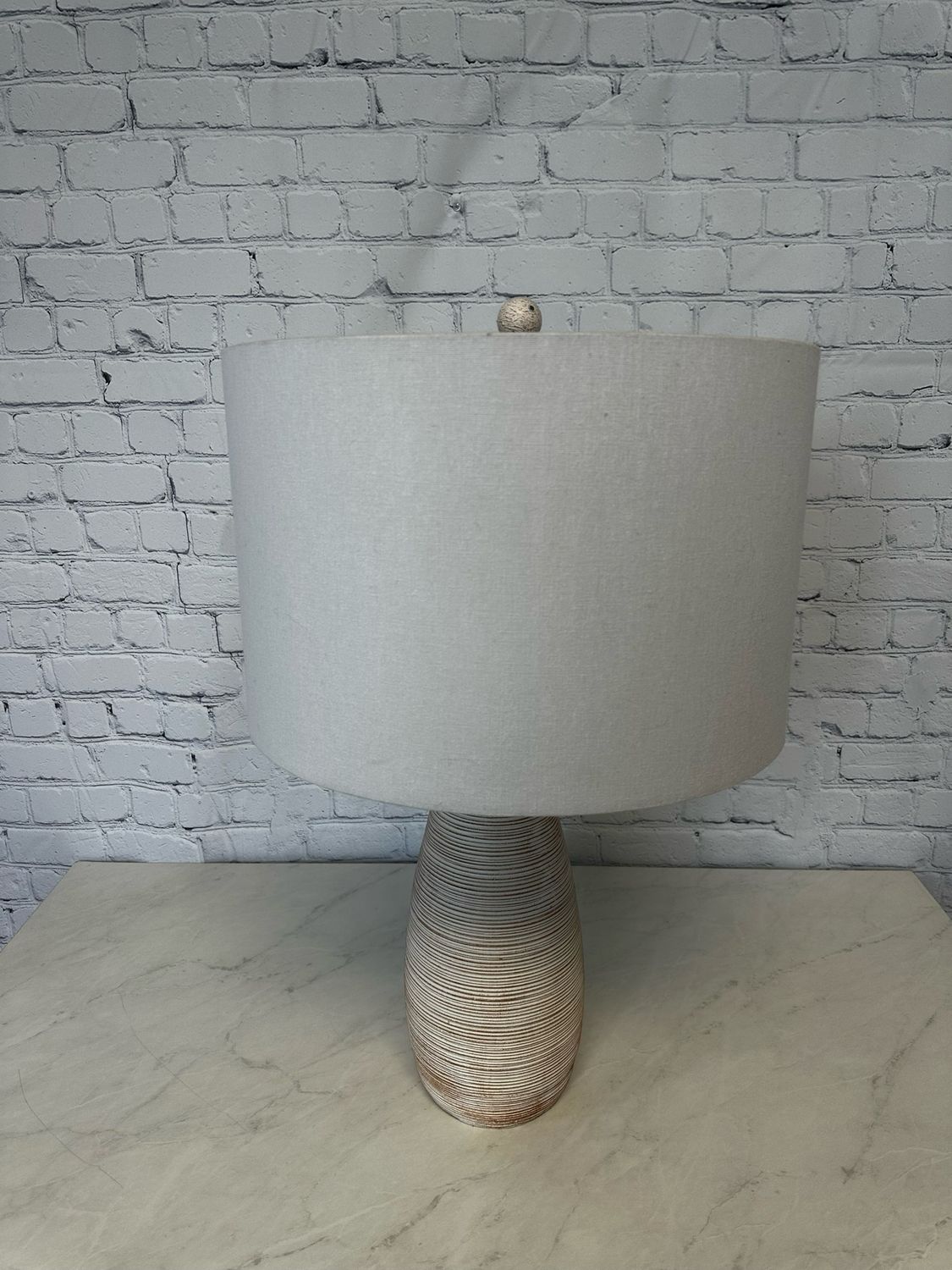 Single Tall Tan Ceramic Lamp
