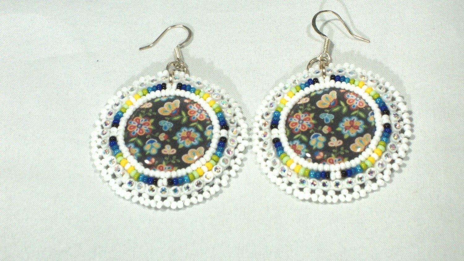 WHITE W/ FLORAL BLACK BACKGROUND