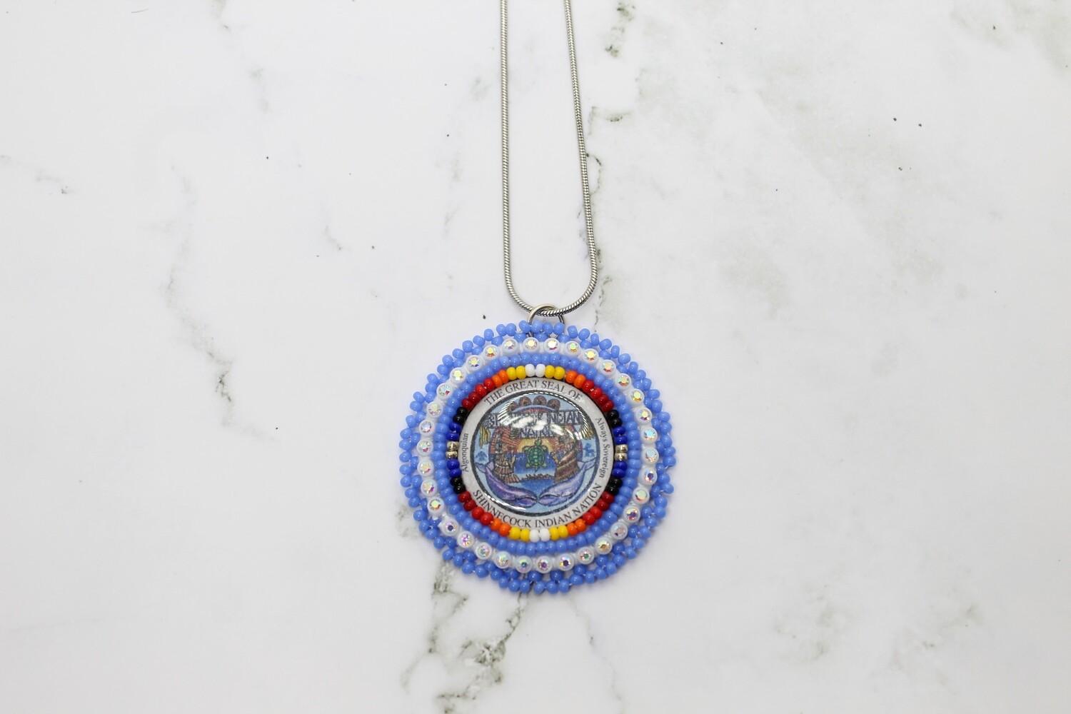 BABY BLUE SHINNECOCK SEAL BEADED PENDANT