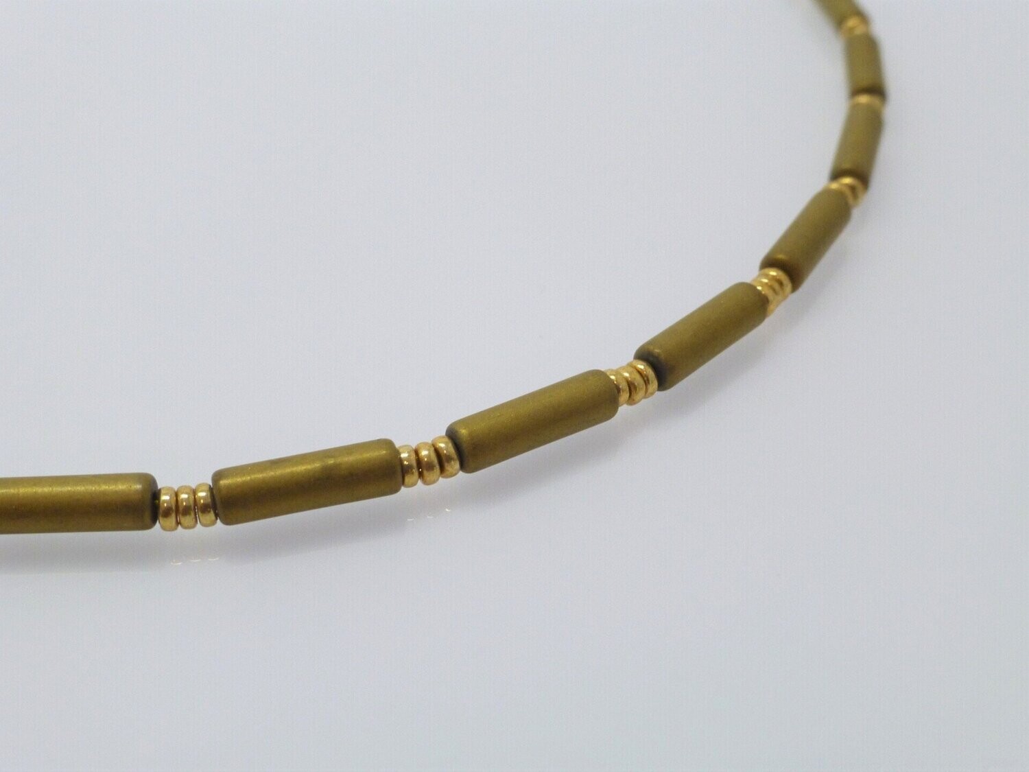 Halskette Hämatit Walzen Gold matt mit Glasringen Gold
