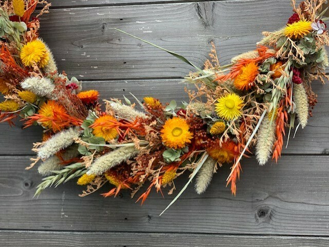 Ring met droogbloemen geel/oranje/natuur