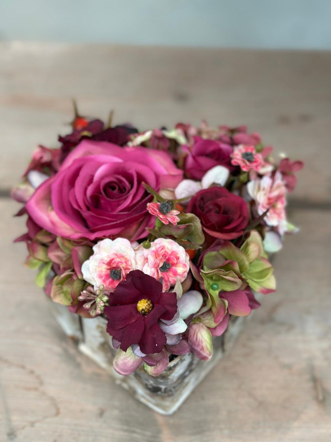 Hart met zijdebloemen