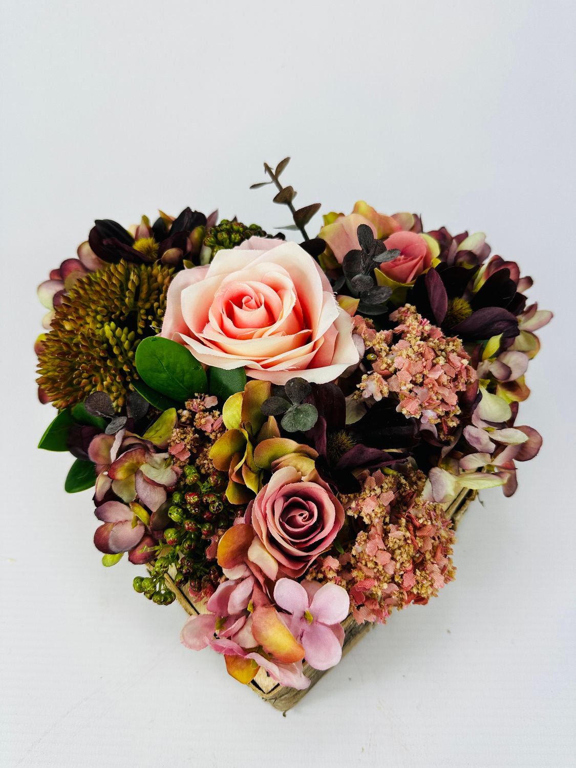 Hart met zijdebloemen