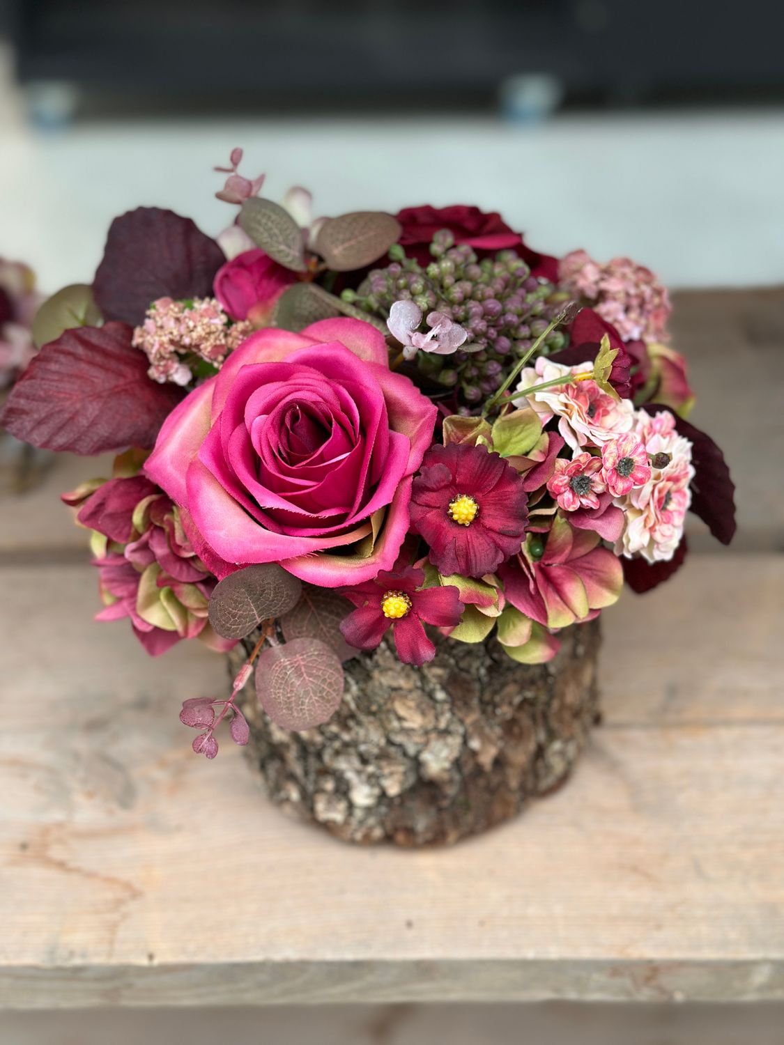 Stronk met zijdebloemen