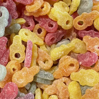Harde zure tutjes van Temmerman, zure fruitgommen in fopspeenvorm en verschillende kleuren, zonder gelatine