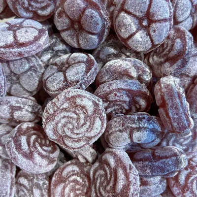 Violettes de Temmerman, bonbons de sucre cuit violets au goût de violette, en forme de fleur