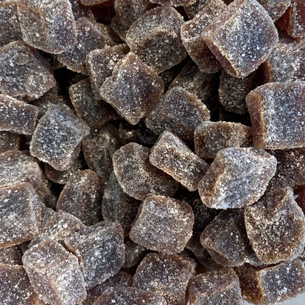 Temmerman ginger sweets, brown soft gum cubes with a spicy ginger flavour, finished with sugar