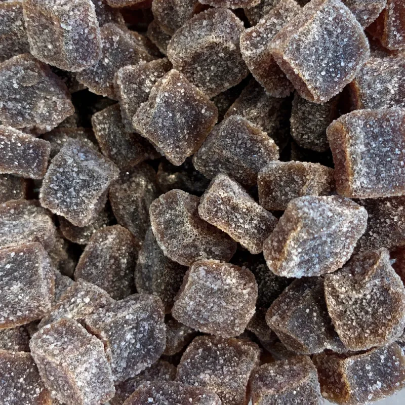 Temmerman ginger sweets, brown soft gum cubes with a spicy ginger flavour, finished with sugar