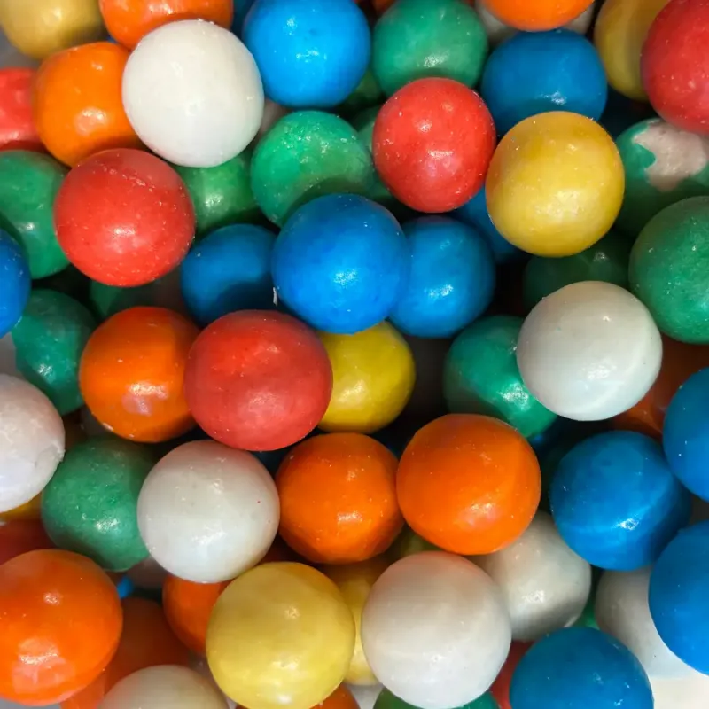 Temmerman gumballs, round chewing gum in various colours with a crisp sugar shell