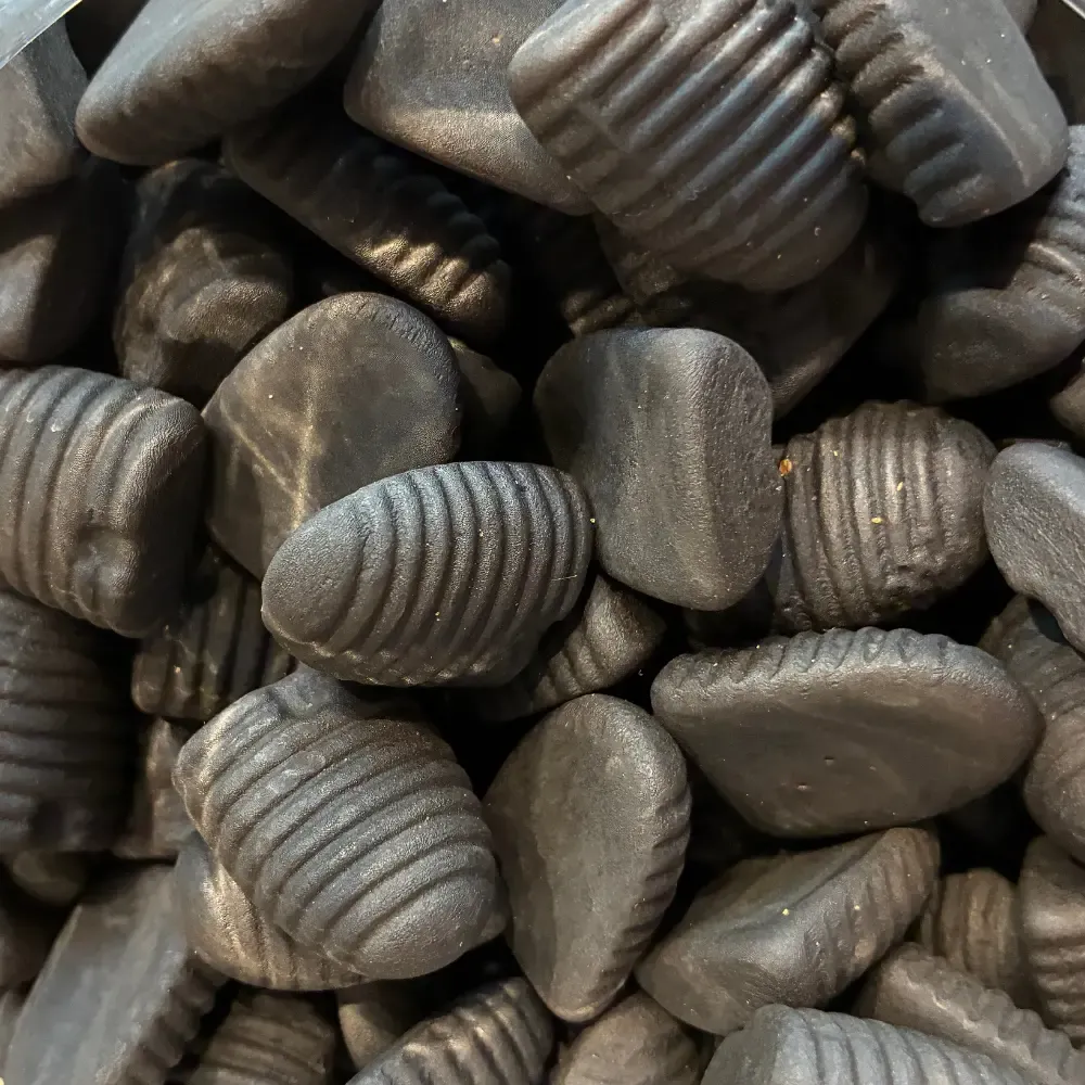 Temmerman honey liquorice, black semi-soft sweet liquorice shaped like a beehive, softened with honey