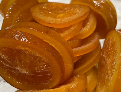 Rodaja de naranja confitada