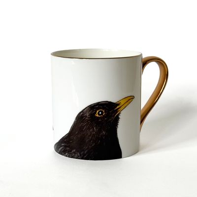 Porcelāna krūze. Strazds