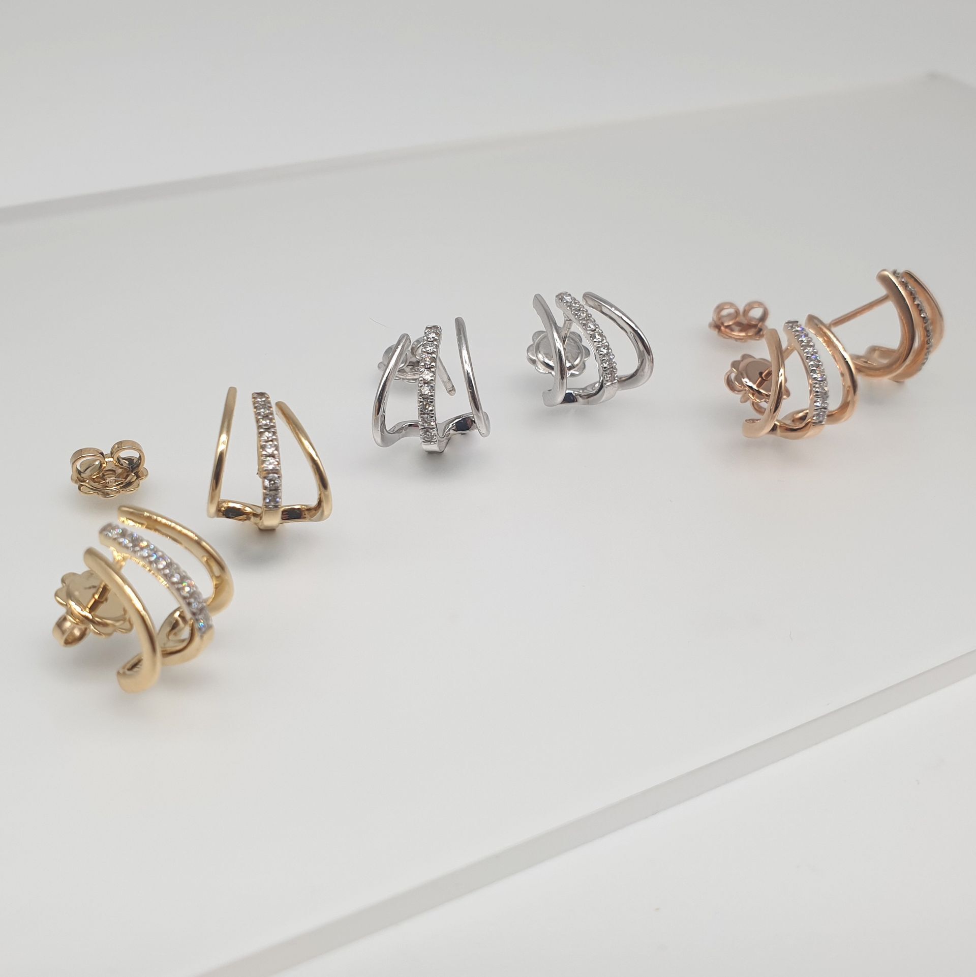 Orecchini Tris in oro  18ct e diamanti
