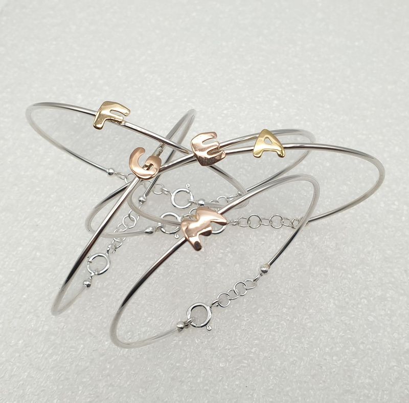 Bracciale rigido in Argento e  lettera in Oro