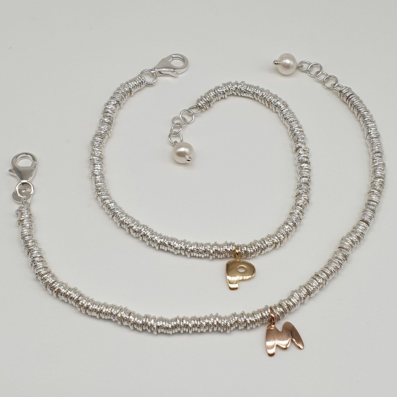 Bracciale in argento 925/000 e  lettera in oro 750/000