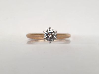 Solitario in oro Rosa  6 punte  con Diamante taglio ct 0.45