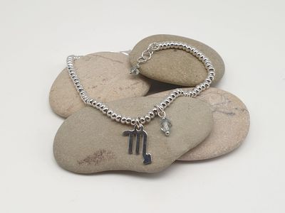 SCORPIONE-topazio azzurro, Bracciale con simbolo e gemma SCORPIONE-topazio azzurro, Bracciale con simbolo e gemma
