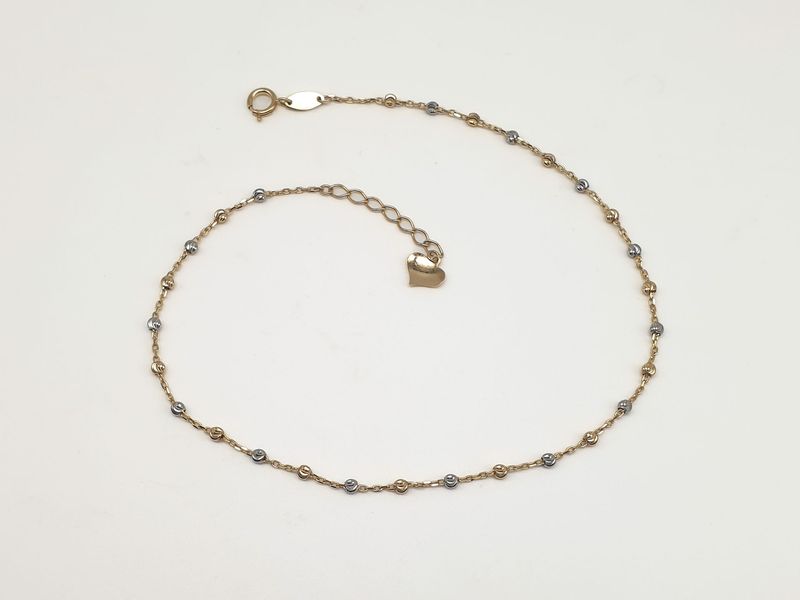 Cavigliera in oro 9ct  “Sfere Luminose”