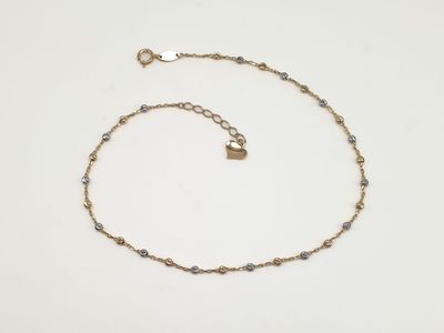 Cavigliera in oro 9ct “Sfere Luminose” Cavigliera in oro 9ct “Sfere Luminose”