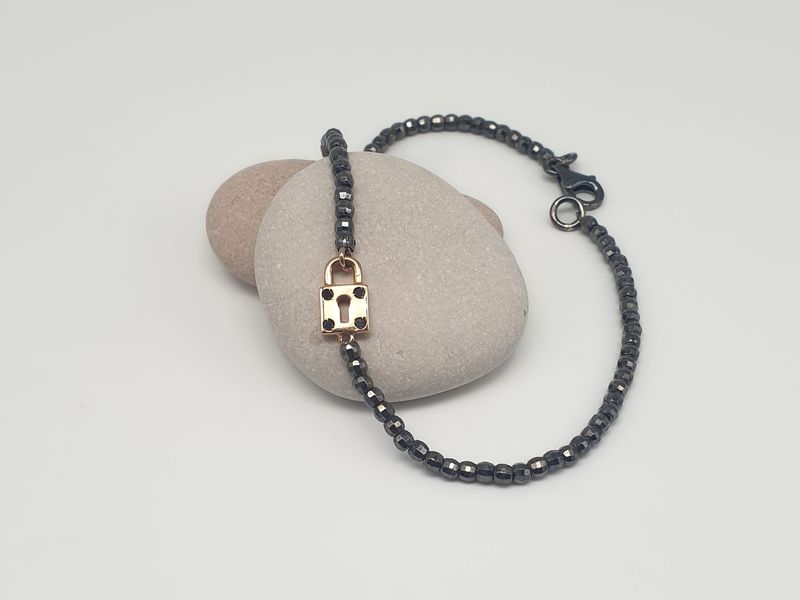 Bracciale in argento 925/000 con lucchetto in oro 18ct e diamanti neri