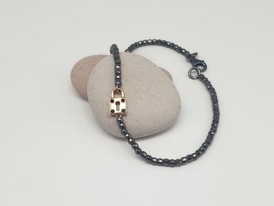 Bracciale in argento 925/000 con lucchetto in oro 18ct e diamanti neri