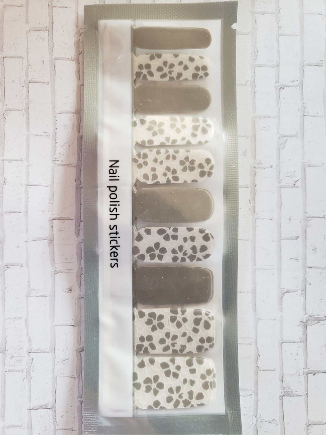279- Light Gray with White and Gray cutouts over Clear (20 strip)