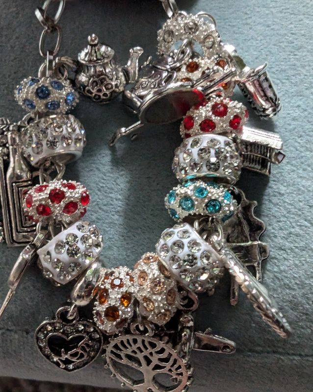 Exotic Necklaces, Charm Bracelets, and Rings