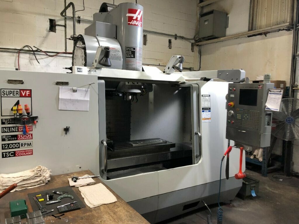 1 - USED HAAS VF4SS 4TH AND 5TH AXIS VERTICAL CNC MACHINING CENTER
