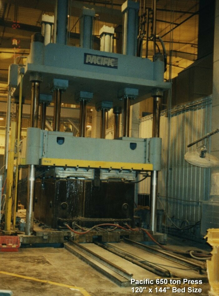 1 - USED 690 TON PACIFIC 4-POST DOWN ACTING HYDRAULIC PRESS