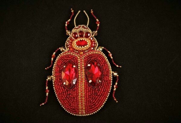 Brooch with crystals "Ruby beetle"