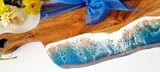 Serving board ocean waves/blue